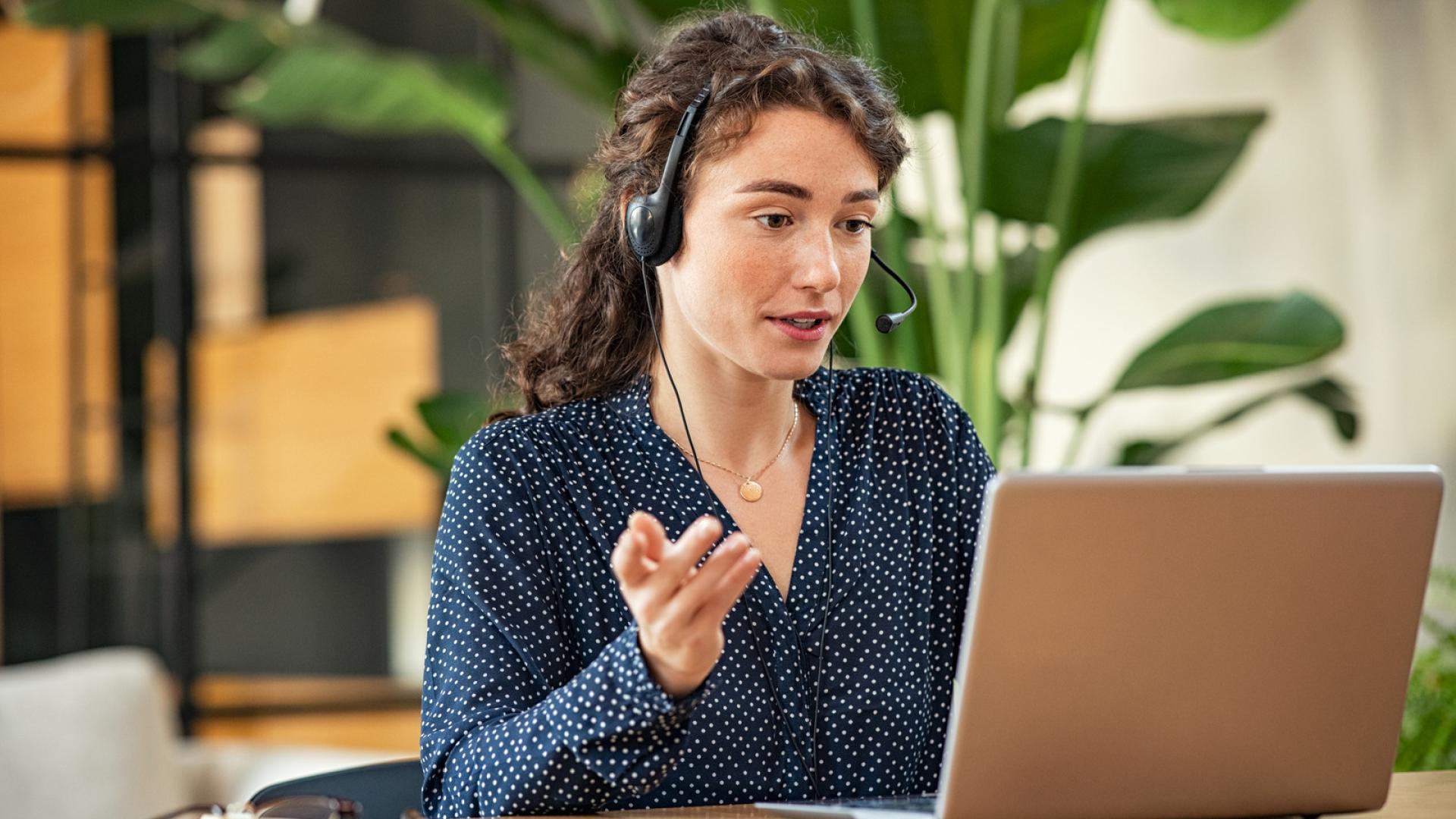 Lady in office on video call
